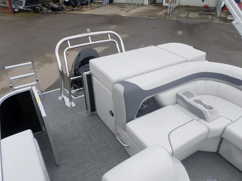 Slide: The Image of 2025 Godfrey Sweetwater 2086 CSE pontoon boat interior with plush seating and cup holders. - 5