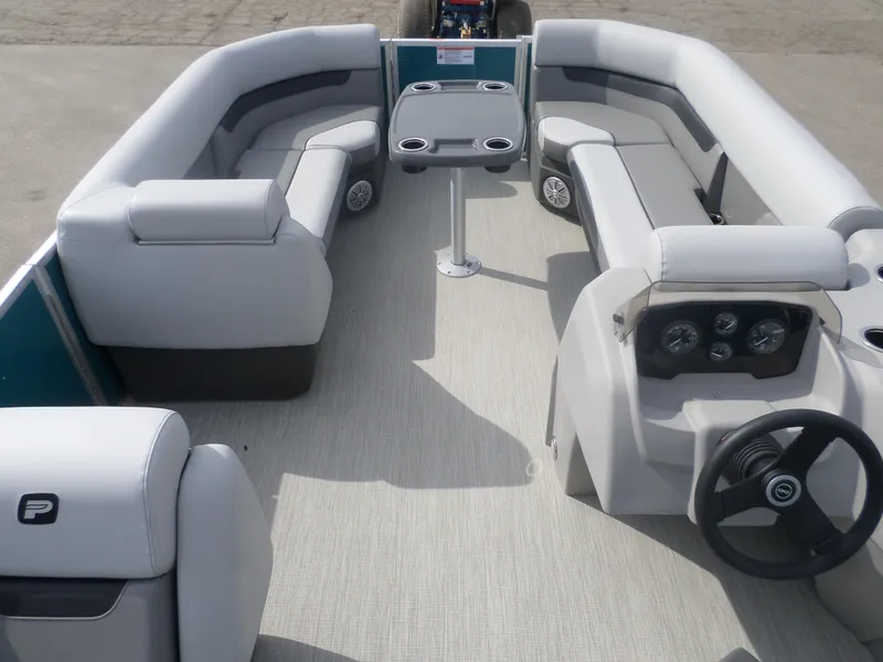 Slide: The Image of 2025 Princecraft Vectra 21 L pontoon boat interior with seating and steering console. - 6