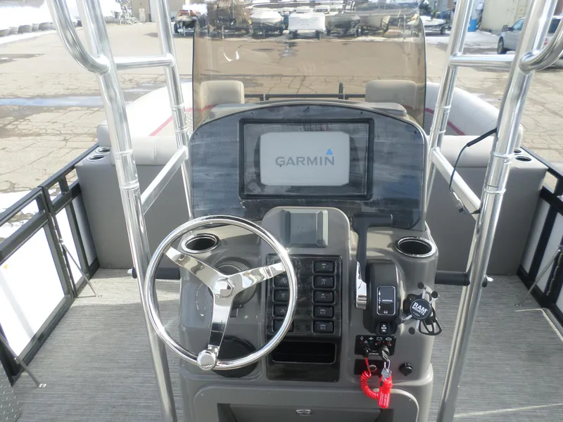 Slide: The Image of 2024 Angler Quest 8524/26 Pro Fish N Cruise boat dashboard with Garmin navigation system. - 6
