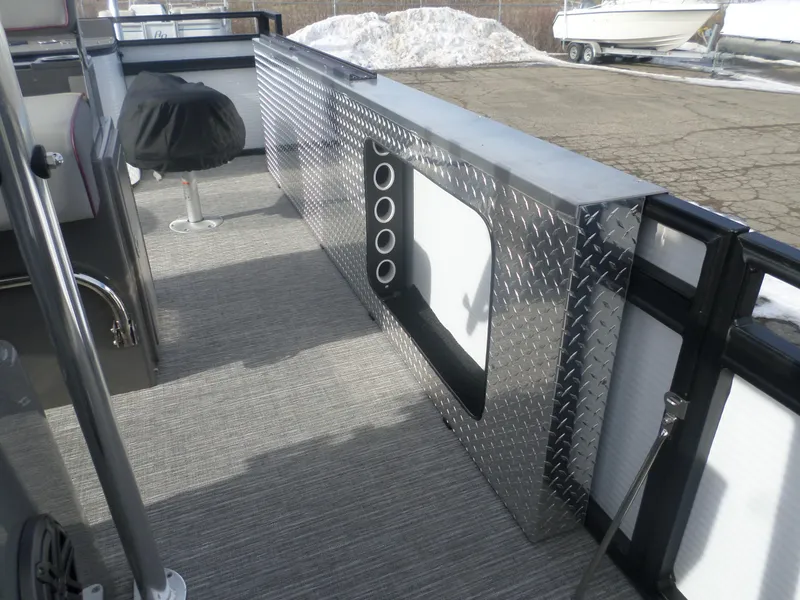 Slide: The Image of 2024 Angler Quest 8524/26 Pro Fish N Cruise interior with diamond plate paneling. - 7