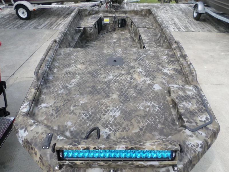 Slide: The Image of 2023 Excel 1751 Viper boat with camouflage design and blue LED light bar. - 5