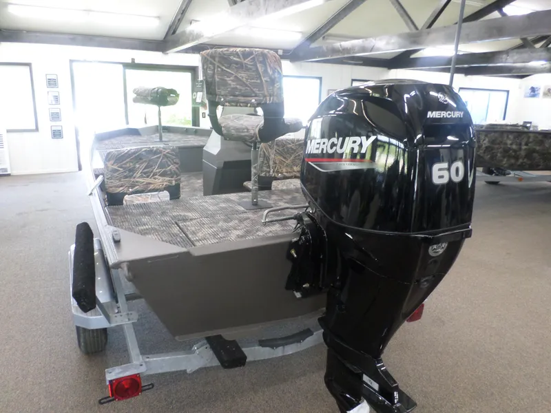 Slide: The Image of 2024 Alweld 1652 VV Marsh SC boat with Mercury 60 outboard motor, camo seats. - 4