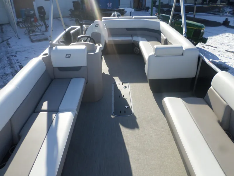 Slide: The Image of 2024 Princecraft Vectra 23 L TRI pontoon boat interior with spacious seating and modern design. - 2