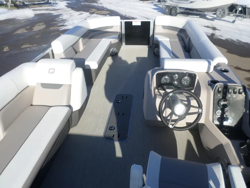 Slide: The Image of 2024 Princecraft Vectra 23 L TRI pontoon boat interior with spacious seating and modern helm. - 3