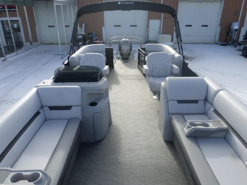 Slide: The Image of 2025 Godfrey Sweetwater 2286SB Tri pontoon boat with spacious seating and modern design. - 3