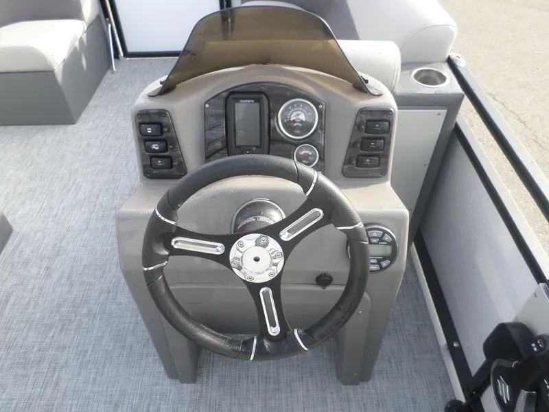 Slide: The Image of 2025 Angler Quest 816 Panfish Cruise steering console with modern controls and dashboard. - 7