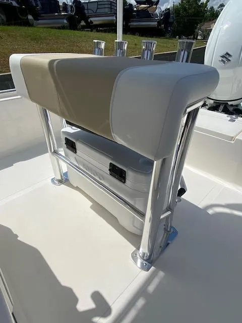 Slide: The Image of 2024 Bulls Bay 2200 boat seating with rod holders and storage compartment. - 10