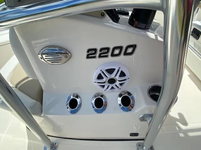 Slide: The Image of 2024 Bulls Bay 2200 boat console with speaker and rod holders. - 5