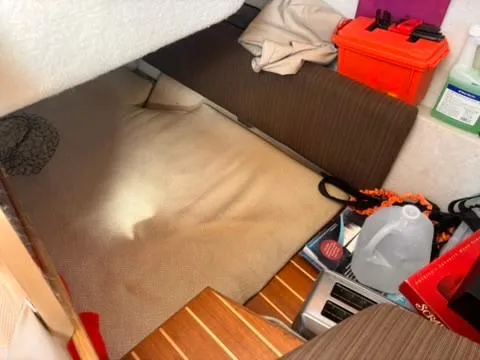 Slide: The Image of Interior cabin of 2016 Cutwater 28 LE boat with storage items and seating area. - 25