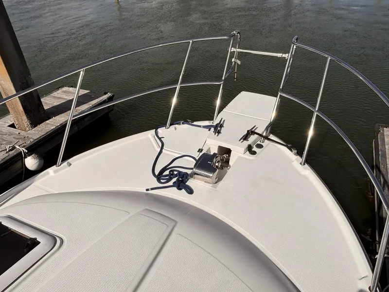 Slide: The Image of Bow of a 2016 Cutwater 28 LE boat with railing and anchor. - 7
