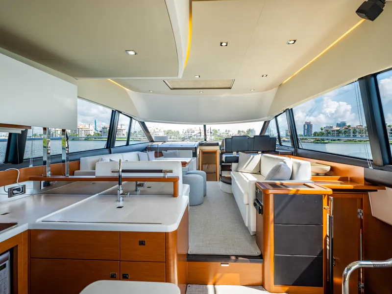 Slide: The Image of Luxurious interior of 2017 Prestige 500 yacht with modern kitchen and seating area. - 15