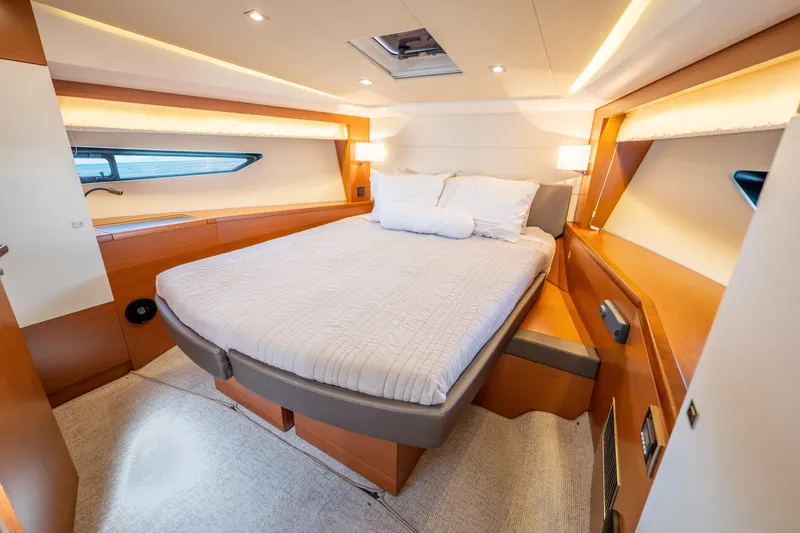 Slide: The Image of Luxurious cabin interior of a 2017 Prestige 500 yacht with a comfortable bed. - 22