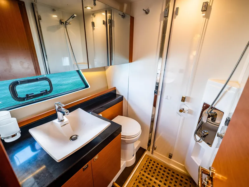 Slide: The Image of Luxurious bathroom in 2017 Prestige 500 yacht with modern fixtures and elegant design. - 24