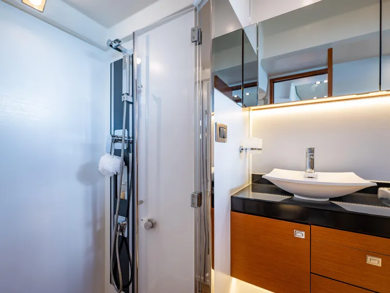 Slide: The Image of Luxurious bathroom in 2017 Prestige 500 yacht with modern fixtures and elegant design. - 34