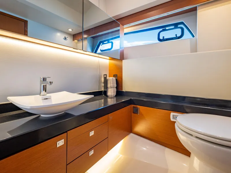 Slide: The Image of Luxurious bathroom interior on a 2017 Prestige 500 yacht, featuring modern fixtures and elegant design. - 35