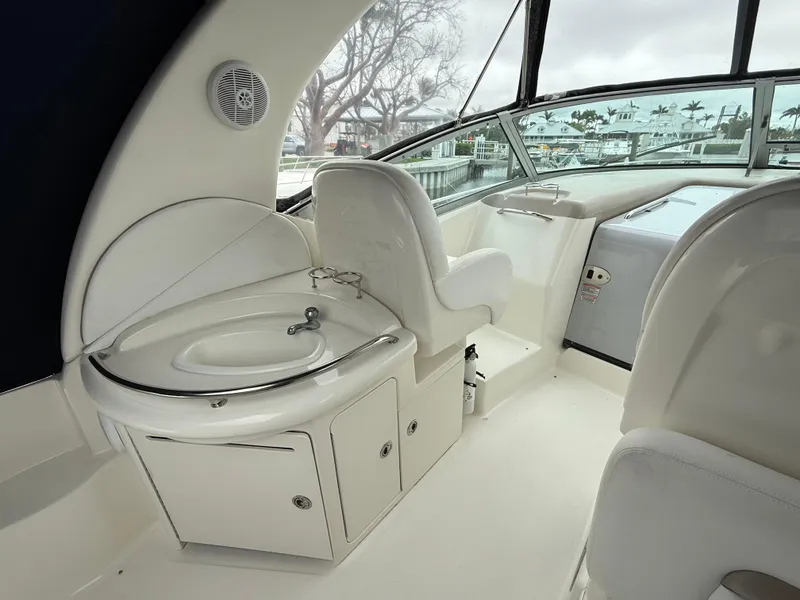 Slide: The Image of 2005 Sea Ray 340 Sundancer yacht interior with sink and seating area. - 11
