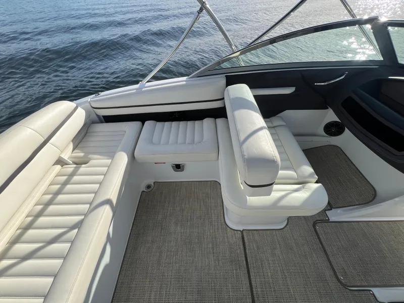 Slide: The Image of Luxurious 2015 Cobalt R3 boat interior with white leather seating and water view. - 14