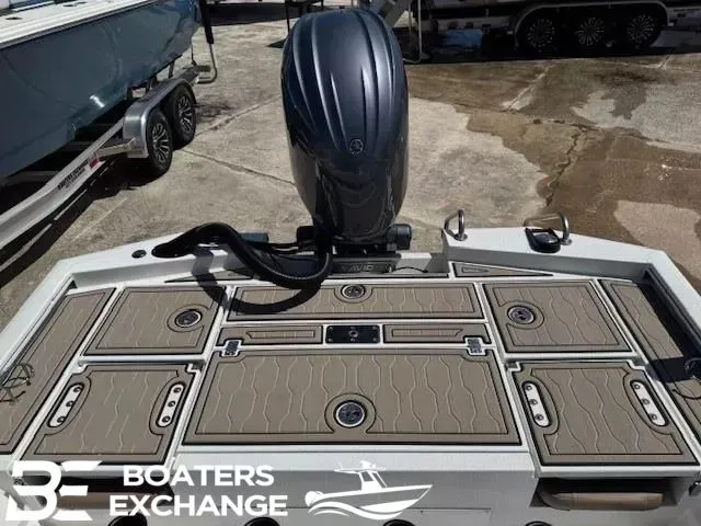 Slide: The Image of Avid 23 Fusion 2025 boat with outboard motor on trailer. - 3