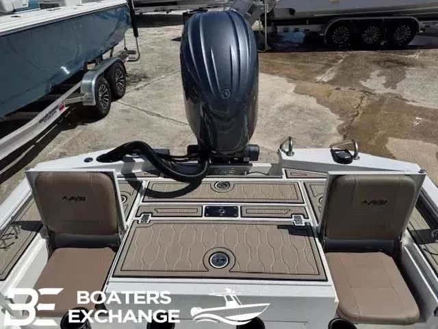 Slide: The Image of Avid 23 Fusion 2025 boat with outboard motor on a trailer. - 4