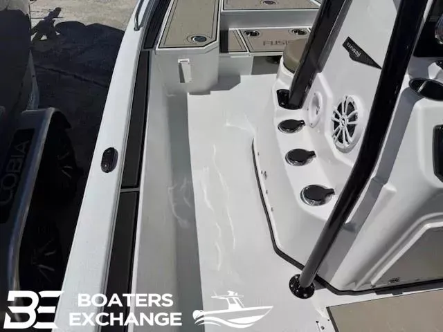 Slide: The Image of Avid 23 Fusion 2025 boat interior, Boaters Exchange logo visible. - 8