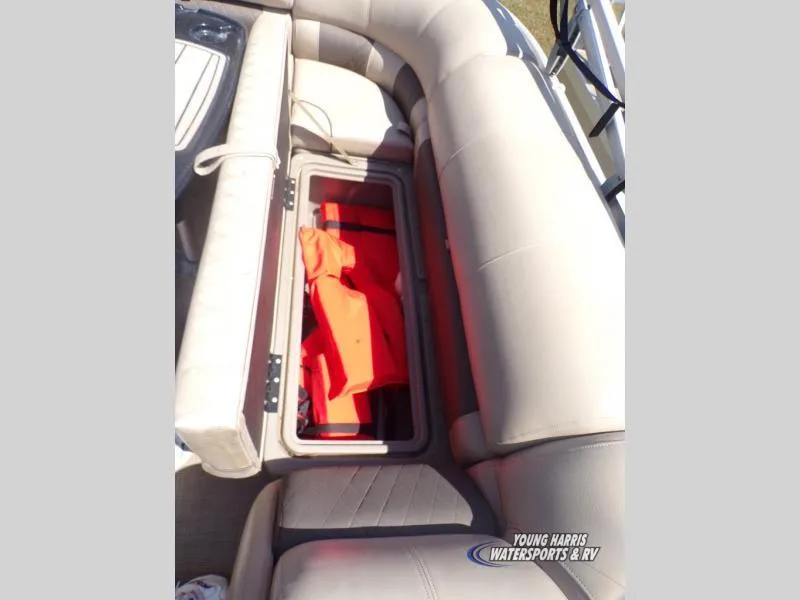 Slide: The Image of 2020 Sun Tracker Party Barge 20DLX storage compartment with life jackets. - 13