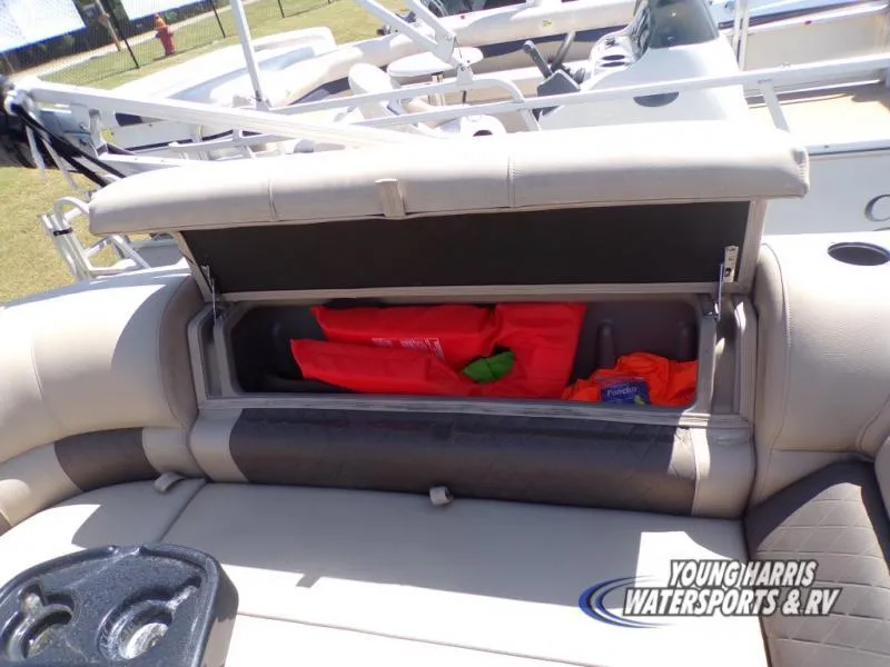 Slide: The Image of 2020 Sun Tracker Party Barge 20DLX storage compartment with life jackets. - 15