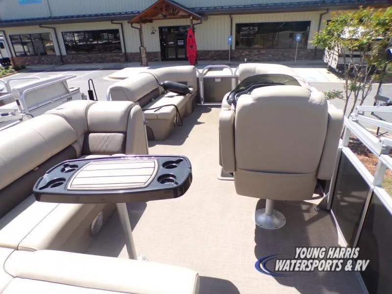 Slide: The Image of 2020 Sun Tracker Party Barge 20DLX interior with beige seating and table. - 5