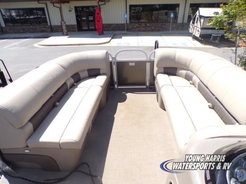 Slide: The Image of 2020 Sun Tracker Party Barge 20DLX interior with spacious seating and outdoor setting. - 7