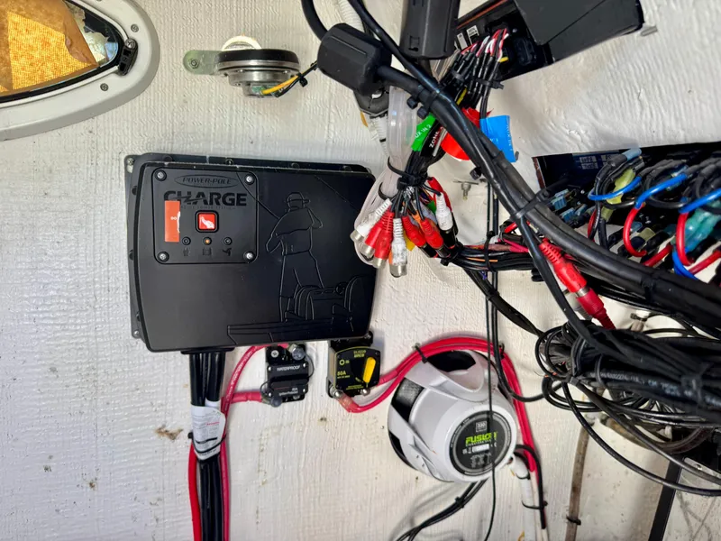 Slide: The Image of Electrical wiring and components inside a 2023 Twin Vee 280 GFX CC boat. - 30