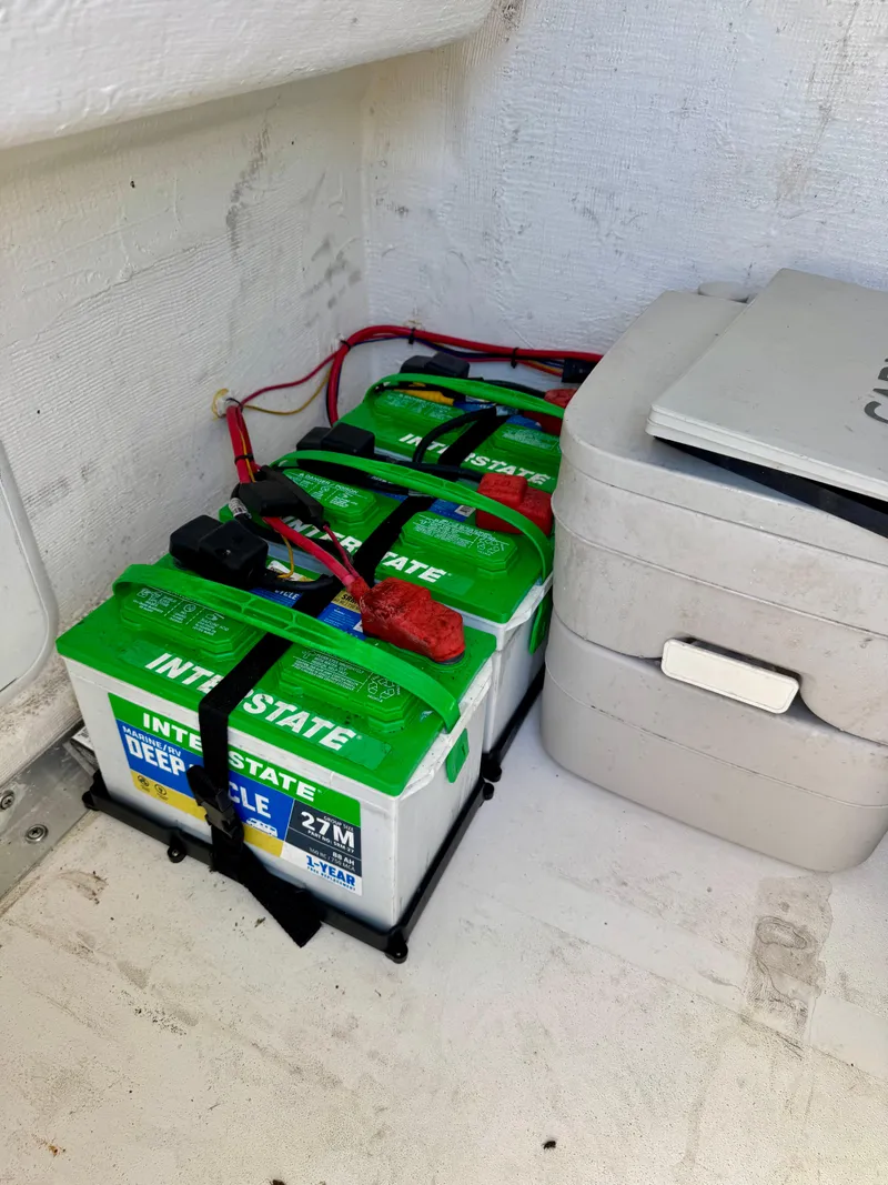 Slide: The Image of 2023 Twin Vee 280 GFX CC boat batteries, Interstate deep cycle, secured with straps. - 31