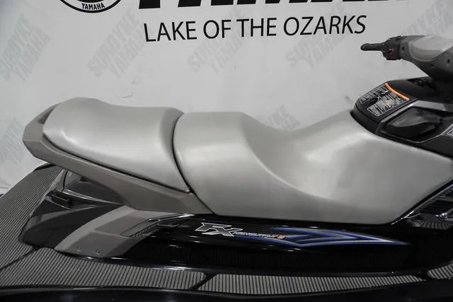Slide: The Image of 2012 Yamaha WaveRunner FX jet ski, side view, featuring sleek silver seat design. - 9
