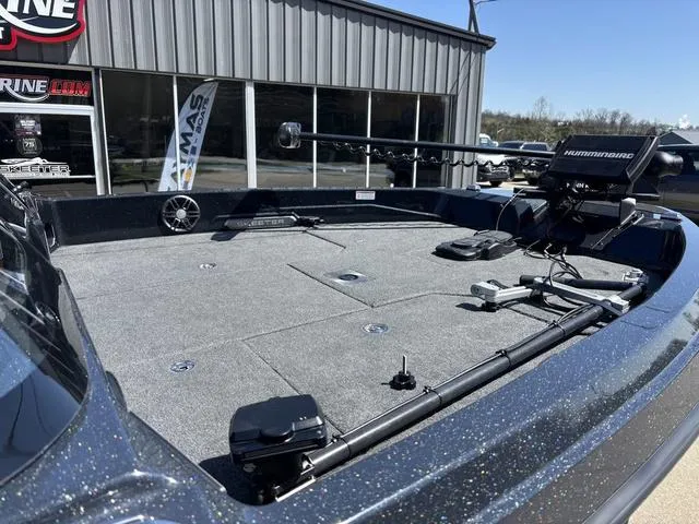 Slide: The Image of 2024 Skeeter WXR2060 F boat deck with fishing equipment and electronics. - 7