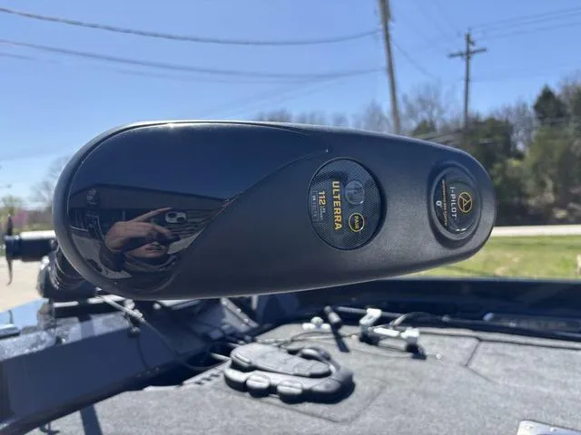 Slide: The Image of 2024 Skeeter WXR2060 F boat with Ulterra motor controls, outdoor setting. - 9