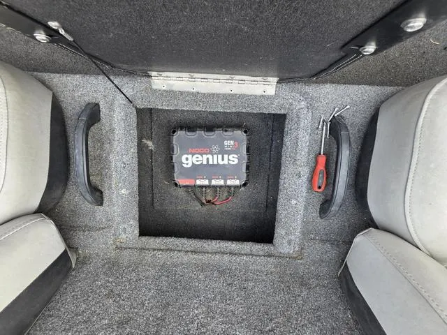 Slide: The Image of Interior of a 2017 Tracker 195 with a Noco Genius battery charger installed. - 12