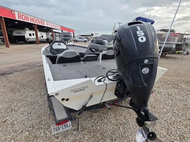 Slide: The Image of 2017 Tracker 195 boat with 150 HP engine at Ron Hoover RV & Marine dealership. - 3
