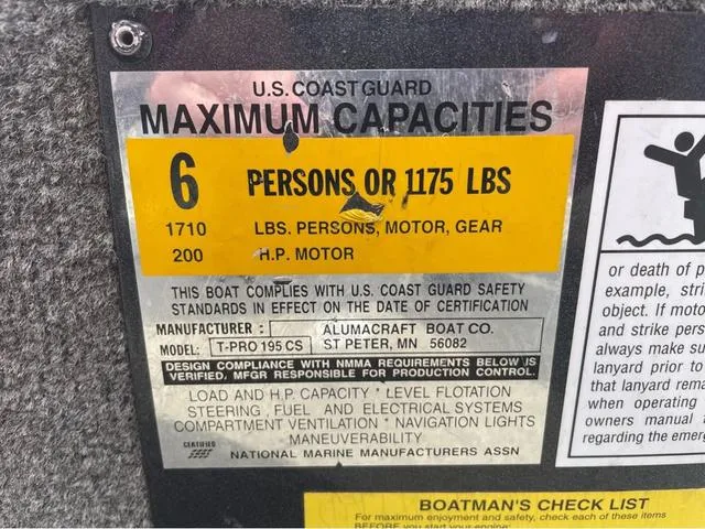 Slide: The Image of U.S. Coast Guard capacity label for 1998 Alumacraft PRO 195, 6 persons or 1175 lbs. - 20