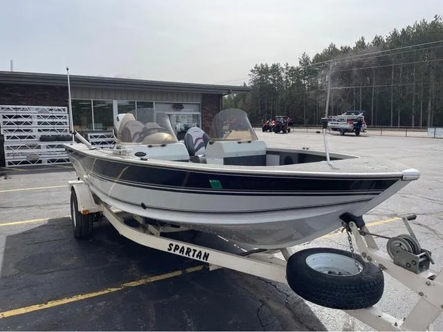 Slide: The Image of 1998 Alumacraft PRO 195 boat on Spartan trailer in parking lot. - 4