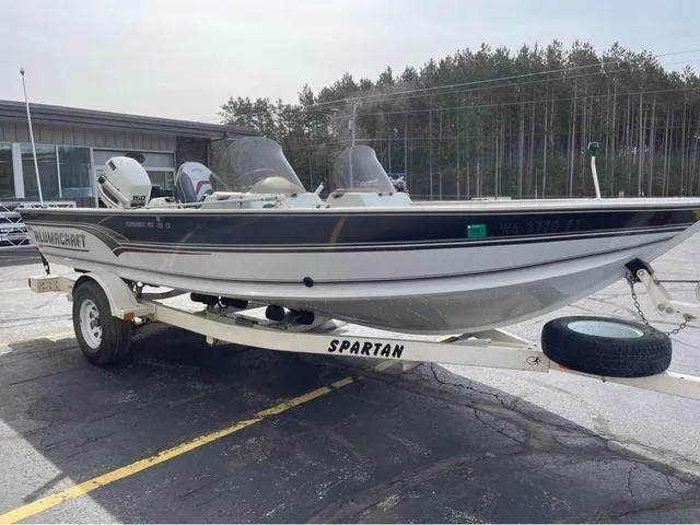 Slide: The Image of 1998 Alumacraft PRO 195 boat on Spartan trailer, parked outdoors. - 5