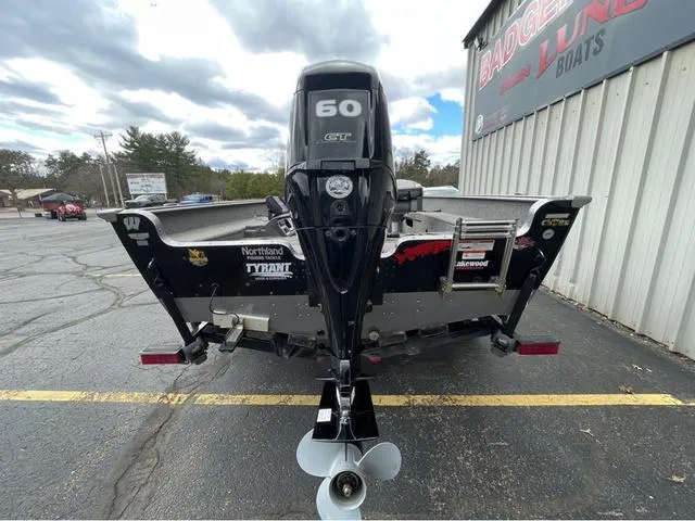 Slide: The Image of 2017 Lund 1675 Pro Guide trolling motor on boat deck. - 26