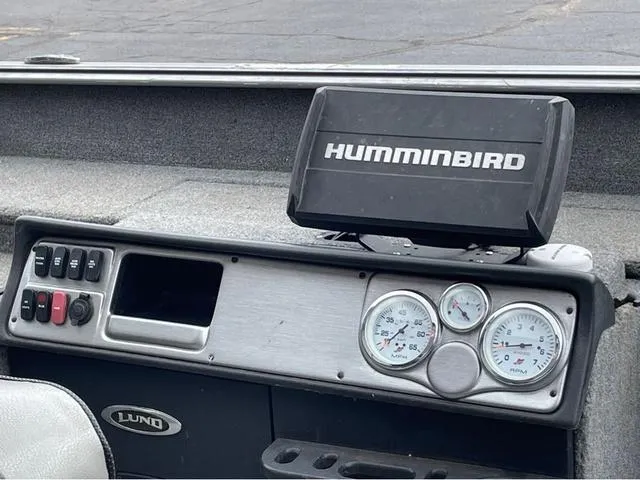 Slide: The Image of Dashboard of 2017 Lund 1675 Pro Guide with Humminbird fish finder and gauges. - 33