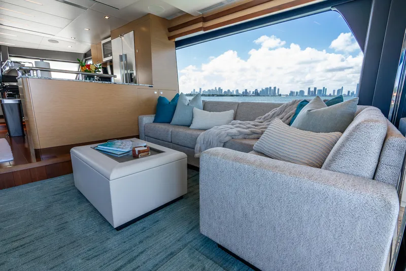 Slide: The Image of Luxurious interior of 2021 Ocean Alexander 70E Motoryacht with city skyline view. - 34