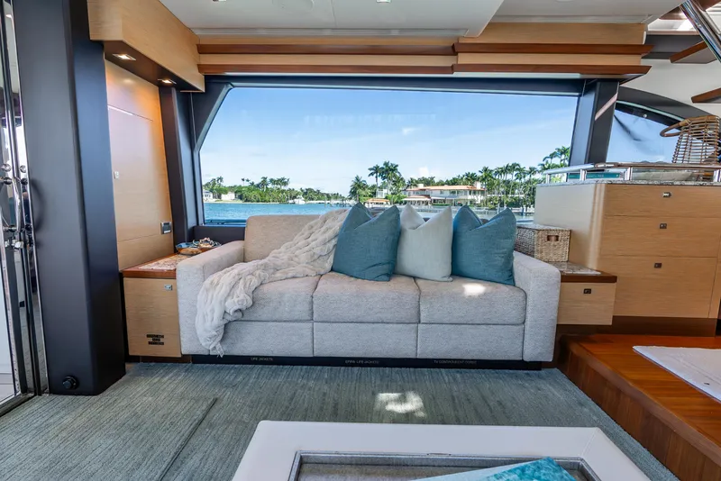 Slide: The Image of Luxurious interior of 2021 Ocean Alexander 70E Motoryacht with scenic window view. - 35