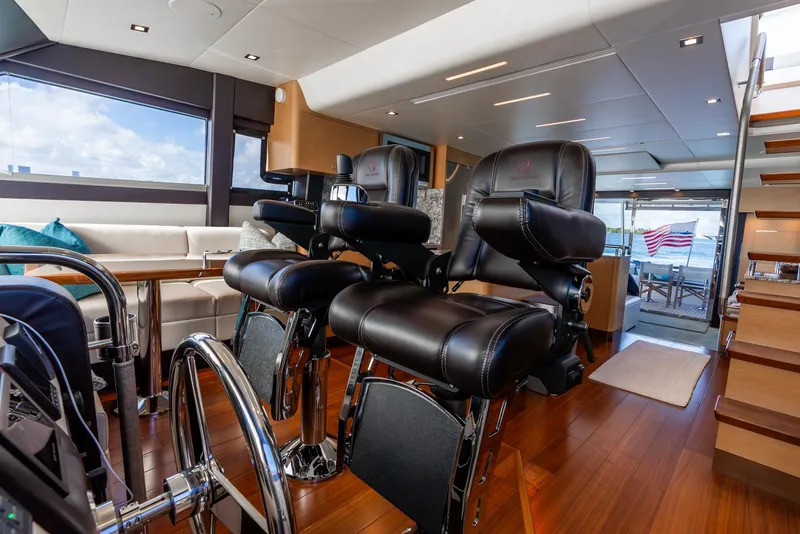 Slide: The Image of Luxurious interior of 2021 Ocean Alexander 70E Motoryacht with leather seating and wooden flooring. - 46