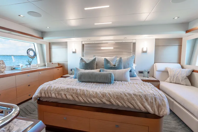 Slide: The Image of Luxurious bedroom interior of 2021 Ocean Alexander 70E Motoryacht with ocean view. - 49