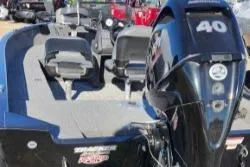 Slide: The Image of 2024 Tracker Super Guide V 16 SC boat with 40 HP engine, interior view. - 3