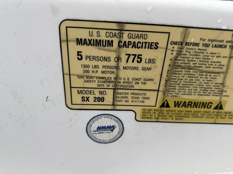 Slide: The Image of 2005 Skeeter SX 200 capacity label, U.S. Coast Guard compliance, 5 persons or 775 lbs. - 18