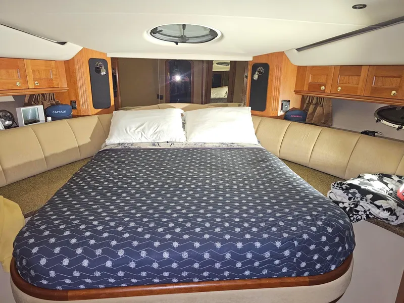 Slide: The Image of Luxurious bedroom interior of 2001 Cruisers Yachts 5000 Sedan Sport. - 35