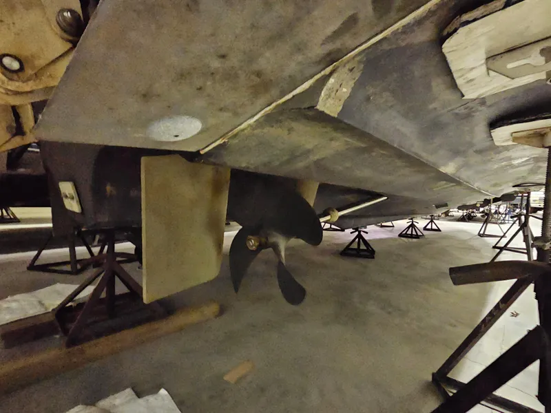 Slide: The Image of Underneath view of a 2001 Cruisers Yachts 5000 Sedan Sport on stands. - 49