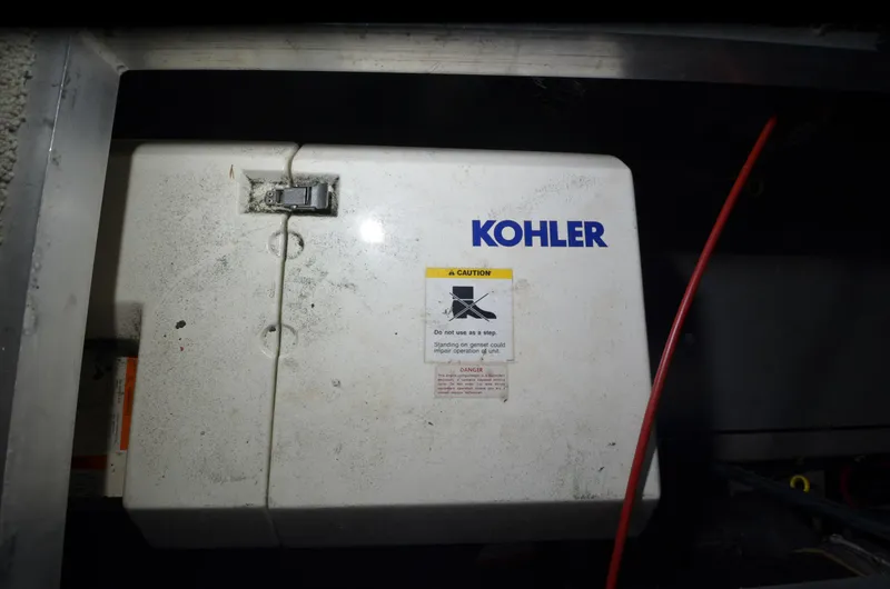 Slide: The Image of Kohler generator in a 1993 Carver 350 Aft boat engine compartment. - 33