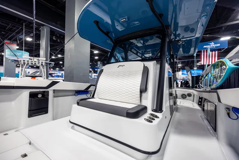 Slide: The Image of 2025 Yellowfin 39 Offshore boat interior with modern seating and sleek design. - 13